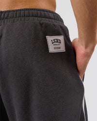 Man wearing Playbook Baggy Cuffed Track Pant - Onyx-Off White | Model:Leandro | Size:M | Thumbnail Index: 19