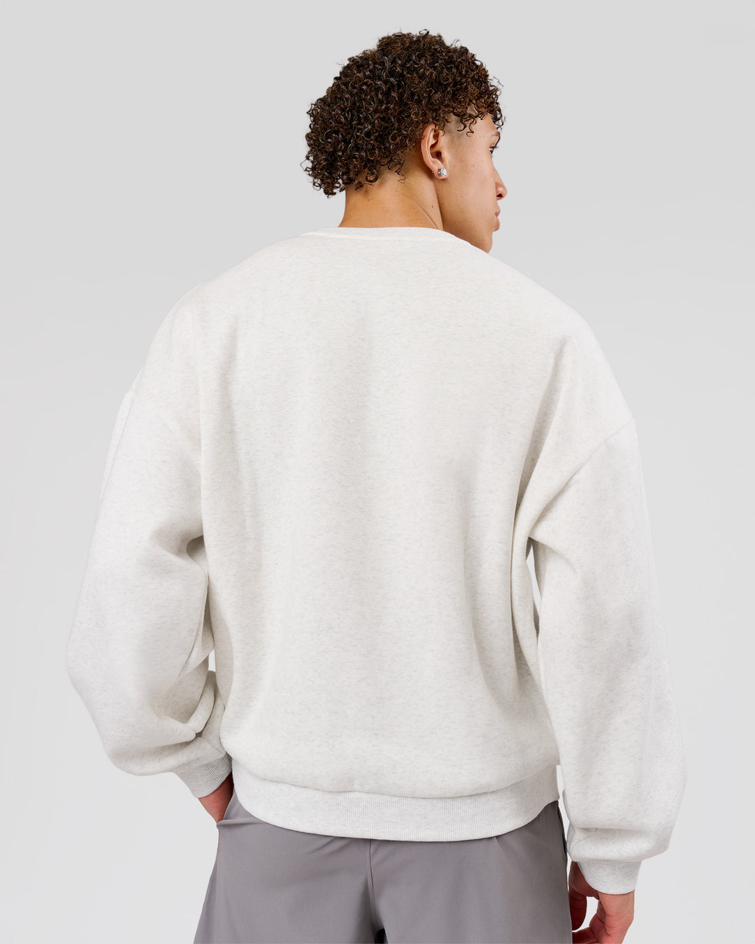 Man wearing Playbook Boxy Crew Sweater - Silver Marl-Open Air | Model:Leandro | Size:M - view 5