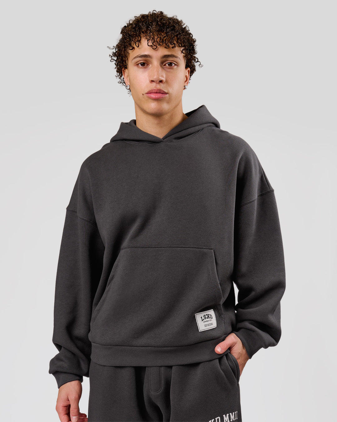 Man wearing Playbook Boxy Hoodie - Onyx-Off White | Model:Leandro | Size:M - view 5
