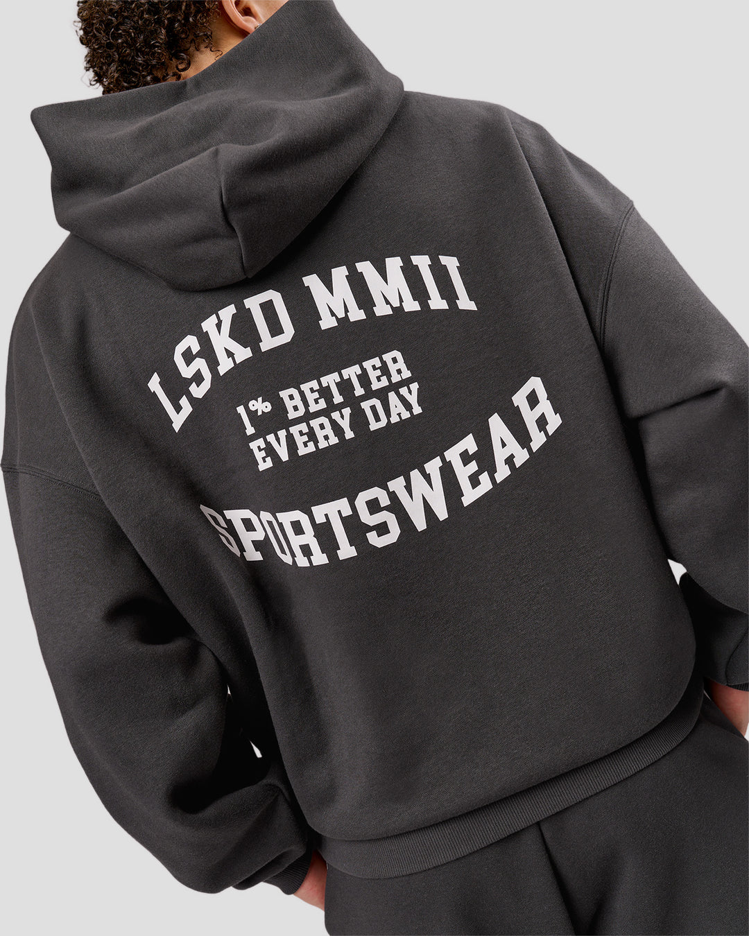 Man wearing Playbook Boxy Hoodie - Onyx-Off White | Model:Leandro | Size:M - view 12
