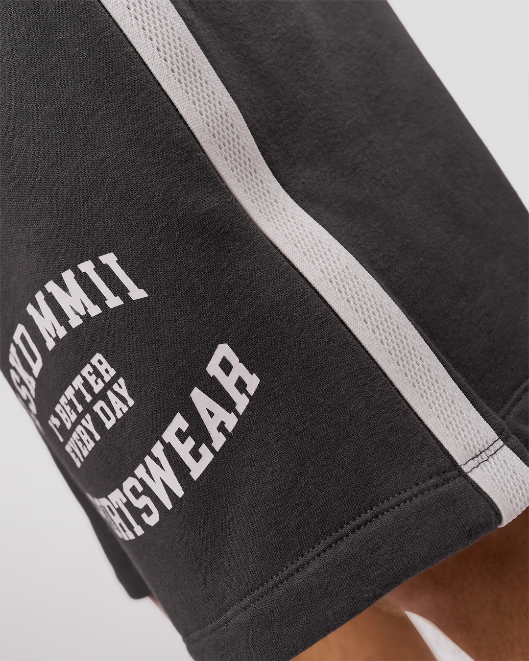 Man wearing Playbook Varsity Fleece Shorts - Onyx-Off White | Model:Leandro | Size:M - view 15