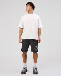 Man wearing Playbook Varsity Fleece Shorts - Onyx-Off White | Model:Leandro | Size:M | Thumbnail Index: 18