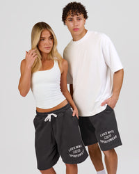 Man wearing Playbook Varsity Fleece Shorts - Onyx-Off White | Model:Leandro | Size:M | Thumbnail Index: 19