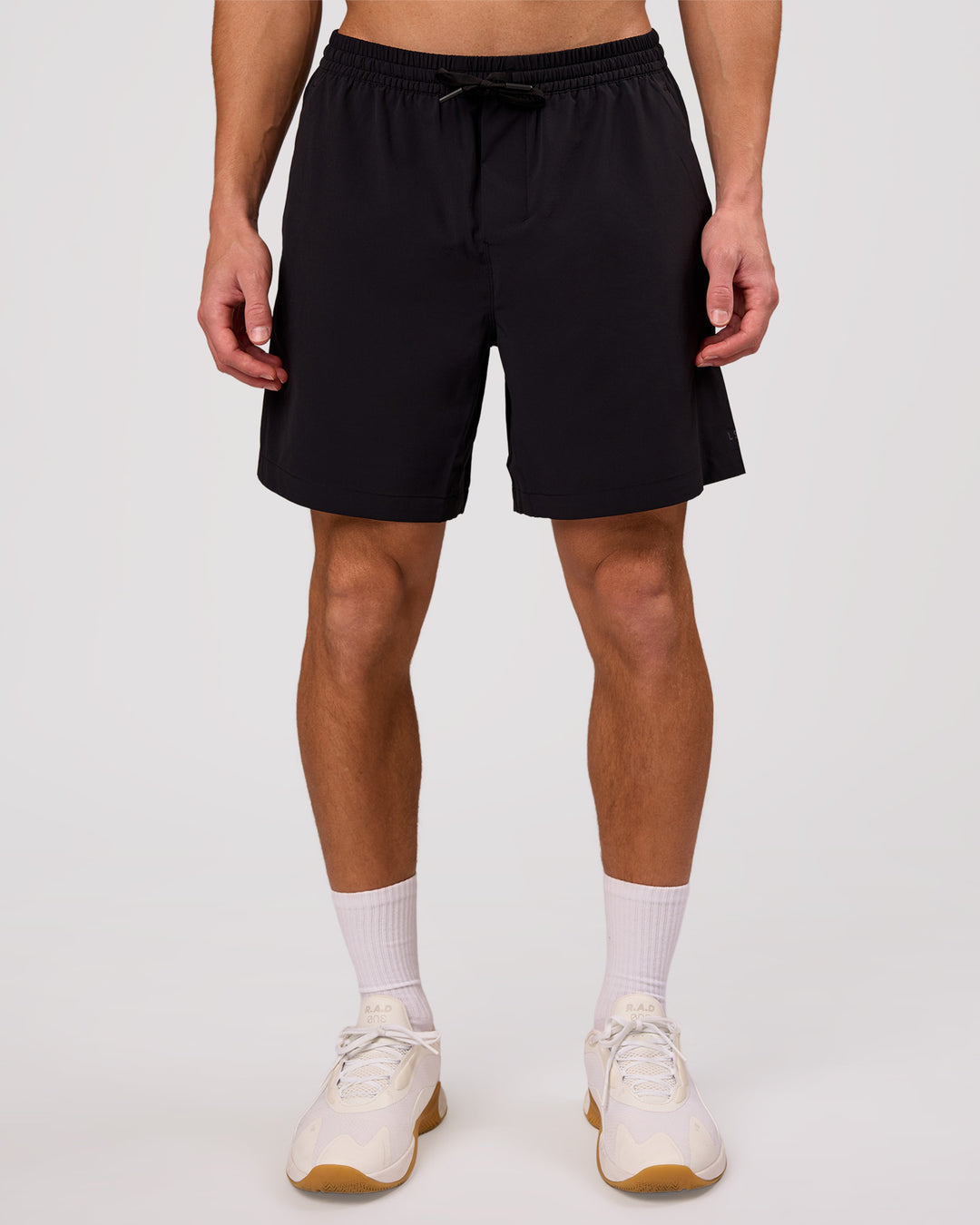 Man wearing Rep Movement 7" Training Short - Black | Model:Leandro | Size:M - view 3