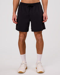 Man wearing Rep Movement 7" Training Short - Black | Model:Leandro | Size:M | Thumbnail Index: 2