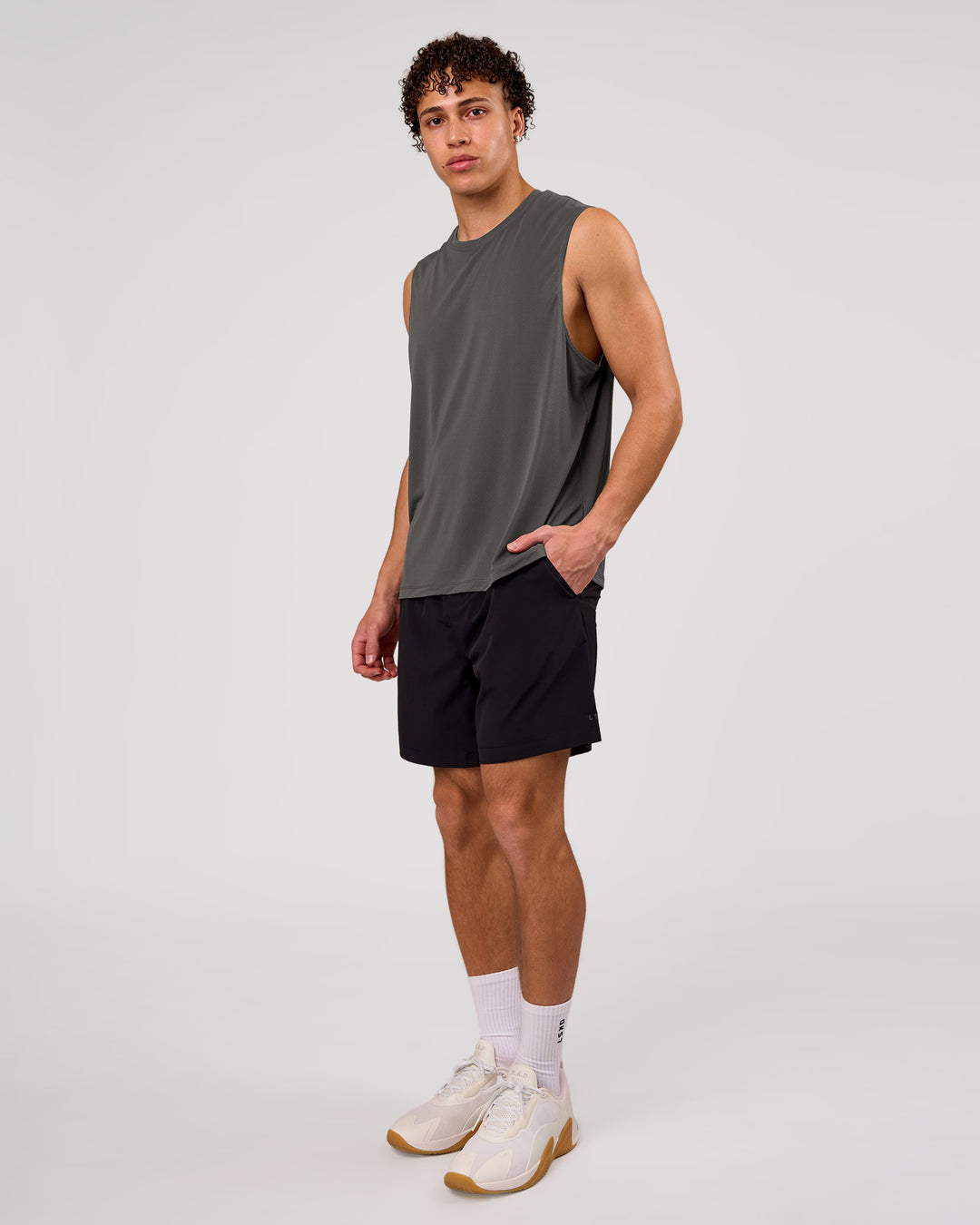 Man wearing Rep Movement 7" Training Short - Black | Model:Leandro | Size:M - view 4