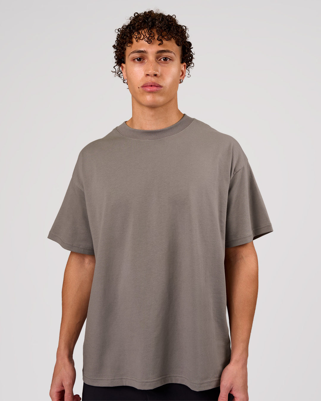 Man wearing Shadow Mark Heavyweight Oversized Tee - Storm Front-Onyx | Model:Leandro | Size:M - view 4