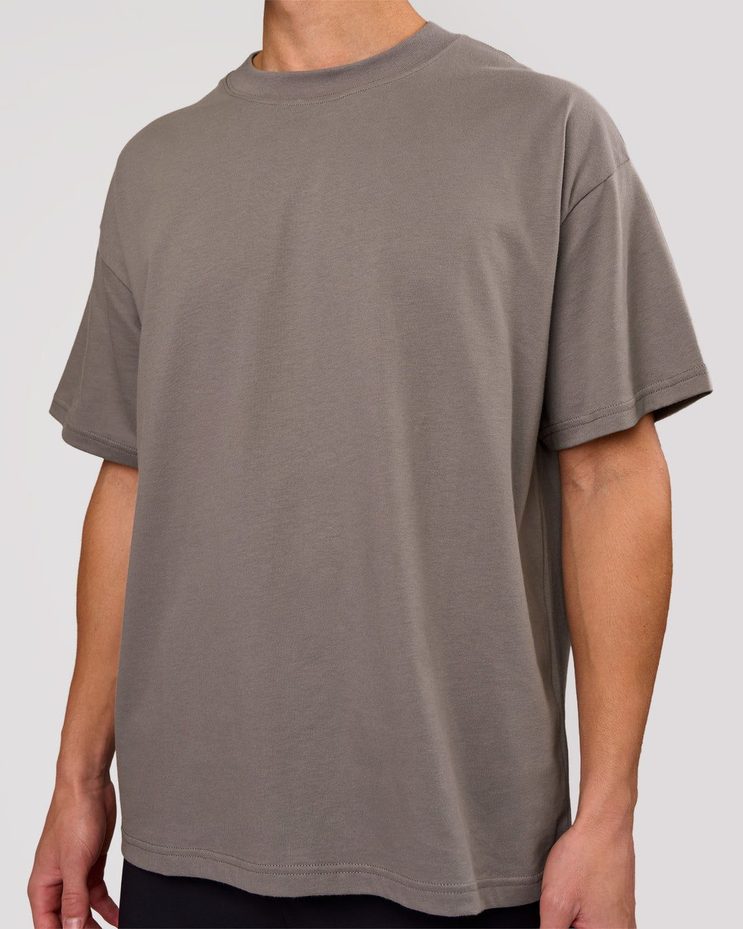 Man wearing Shadow Mark Heavyweight Oversized Tee - Storm Front-Onyx | Model:Leandro | Size:M - view 6