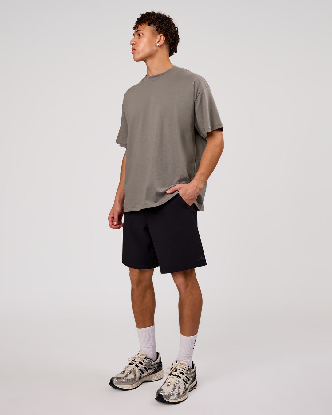 Man wearing Shadow Mark Heavyweight Oversized Tee - Storm Front-Onyx | Model:Leandro | Size:M - view 8