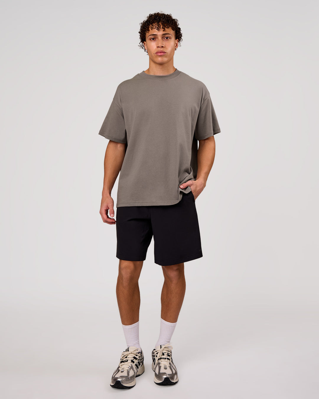 Man wearing Shadow Mark Heavyweight Oversized Tee - Storm Front-Onyx | Model:Leandro | Size:M - view 10