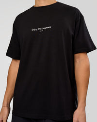 Man wearing VS1 Enjoy The Journey FLXCotton Oversize Tee - Black | Model:Leandro | Size:M | Thumbnail Index: 9