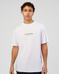 Man wearing VS1 Enjoy The Journey FLXCotton Oversize Tee - White | Model:Leandro | Size:M | Thumbnail Index: 1