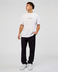 Man wearing VS1 Enjoy The Journey FLXCotton Oversize Tee - White | Model:Leandro | Size:M | Thumbnail Index: 7