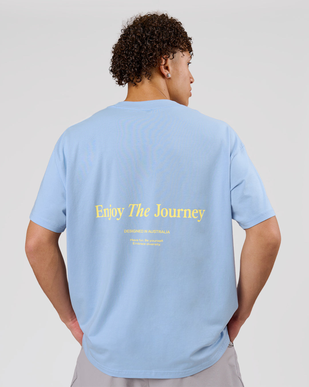 Man wearing VS26 Journey FLXCotton Oversize Tee - Open Air-Lemon | Model:Leandro | Size:M - view 2