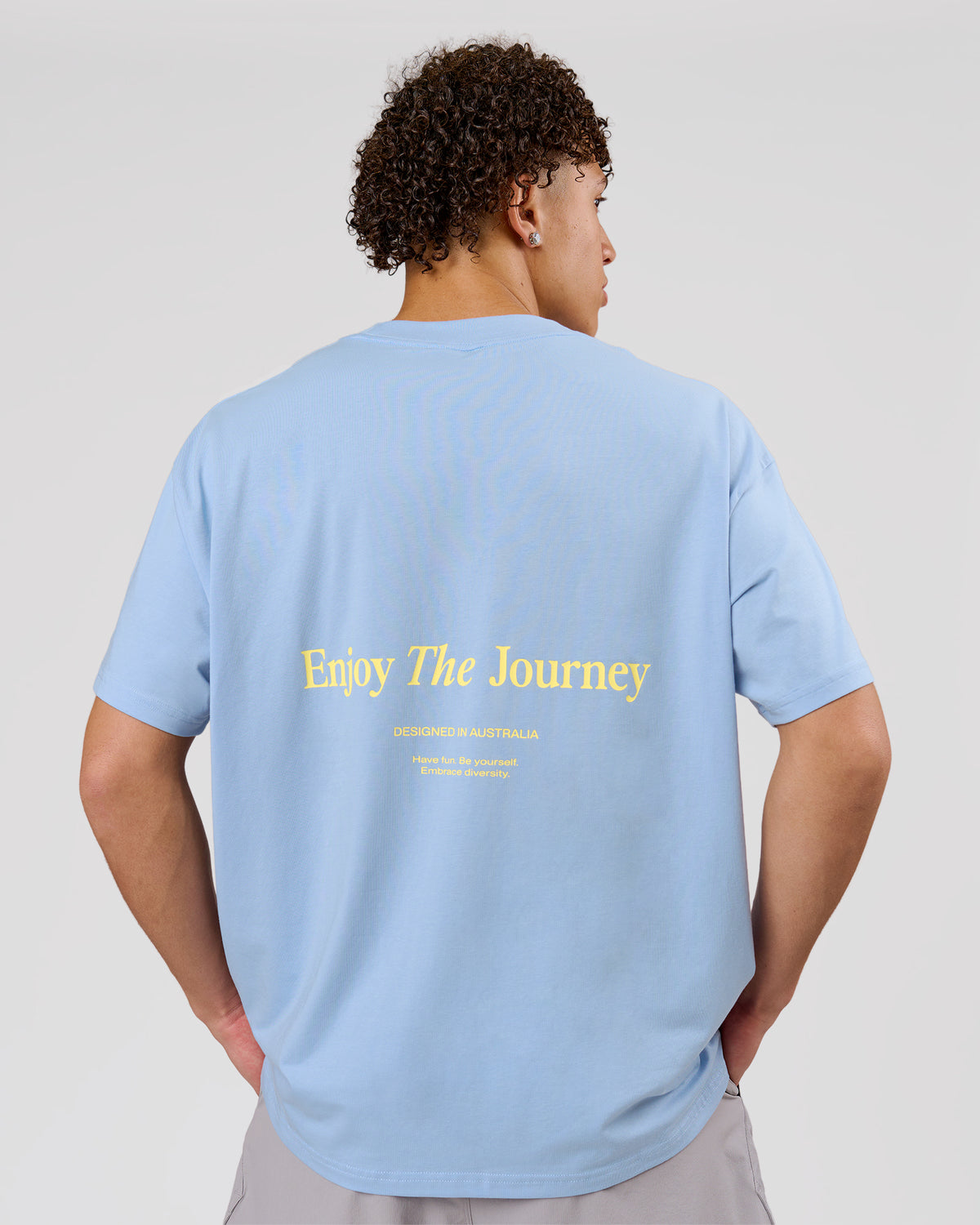 Man wearing VS26 Journey FLXCotton Oversize Tee - Open Air-Lemon | Model:Leandro | Size:M - view 2