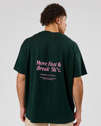 Man wearing VS26 MFBS FLXCotton Oversize Tee - Midnight Green-Pink Rose | Model:Leandro | Size:M | Thumbnail Index: 1