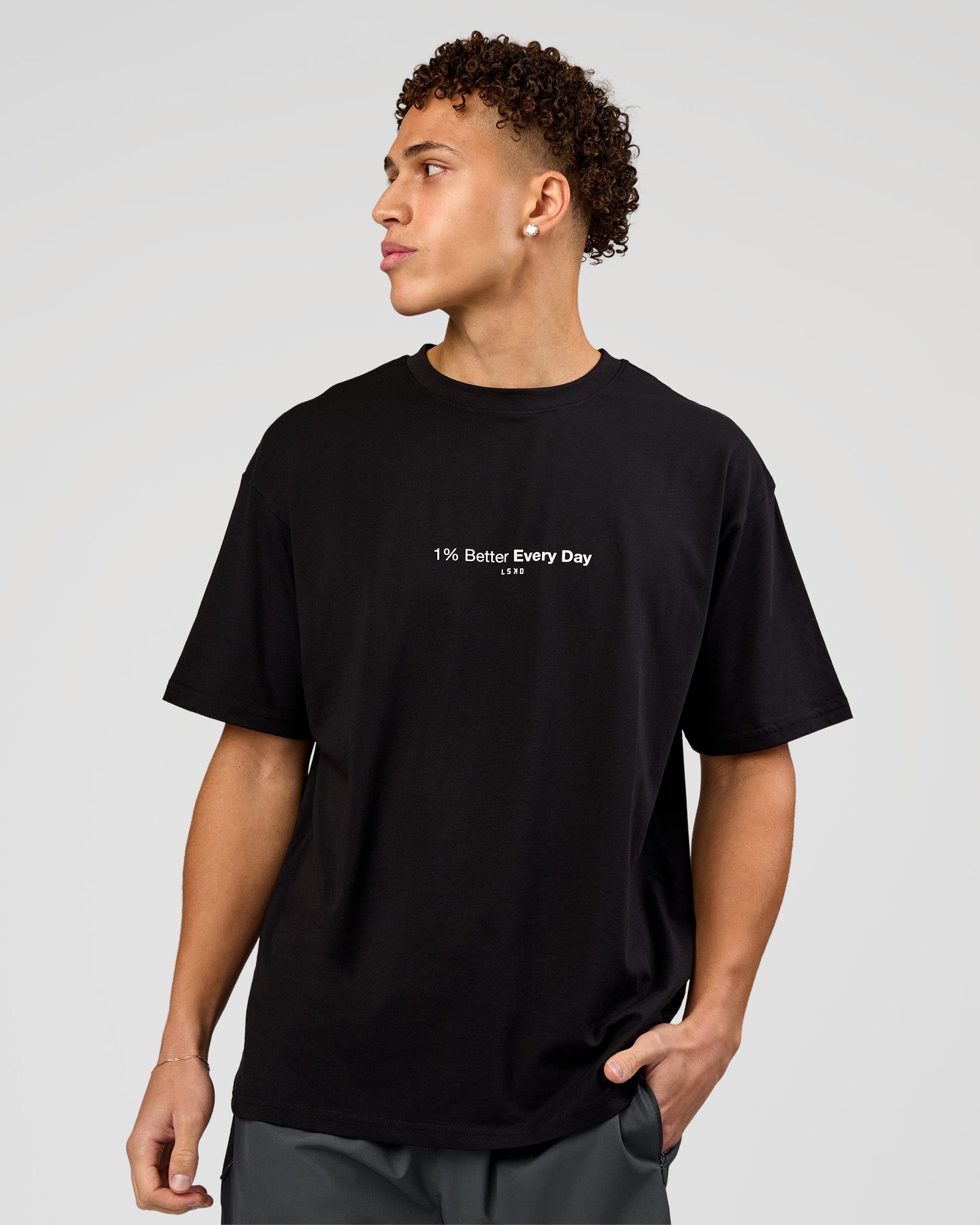 Man wearing VS6 1% Better FLXCotton Oversize Tee - Black | Model:Leandro | Size:M