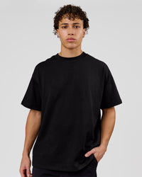 Man wearing Shadow Mark Heavyweight Oversized Tee - Black-Onyx | Model:Leandro | Size:M | Thumbnail Index: 4