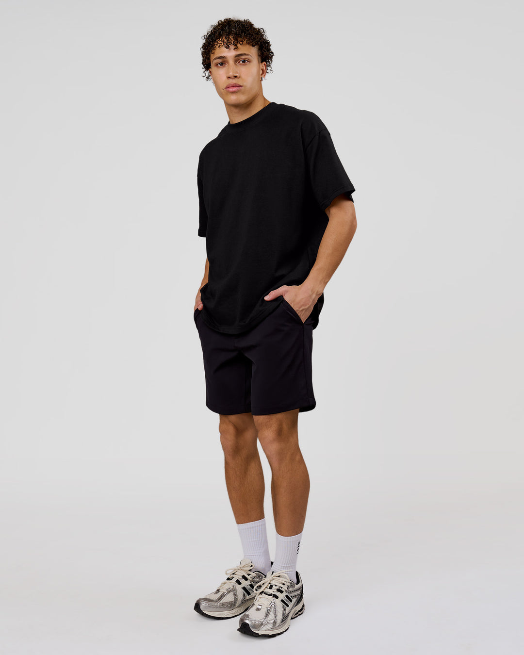 Man wearing Shadow Mark Heavyweight Oversized Tee - Black-Onyx | Model:Leandro | Size:M - view 14