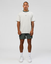 Man wearing Be Here Now Heavyweight FLXCotton Tee Oversize - Silver Marl-Midnight Green | Model:Malebo | Size:M | Thumbnail Index: 5