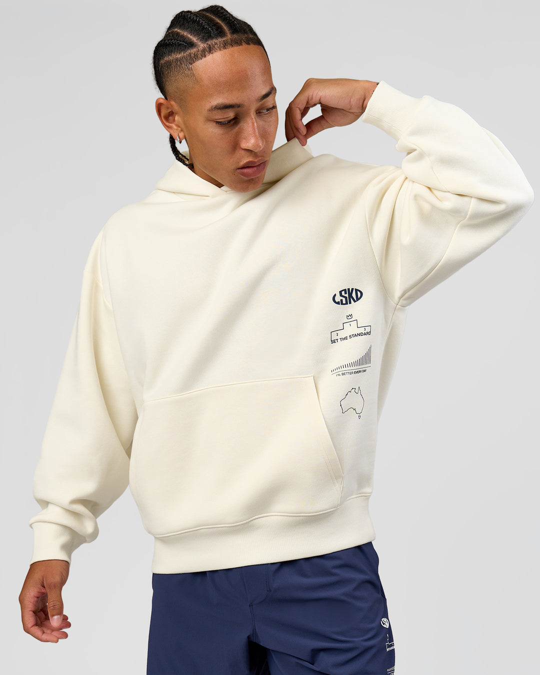 Man wearing Greatest of All Time Heavyweight Oversized Hoodie - Off White | Model:Malebo | Size:M - view 15