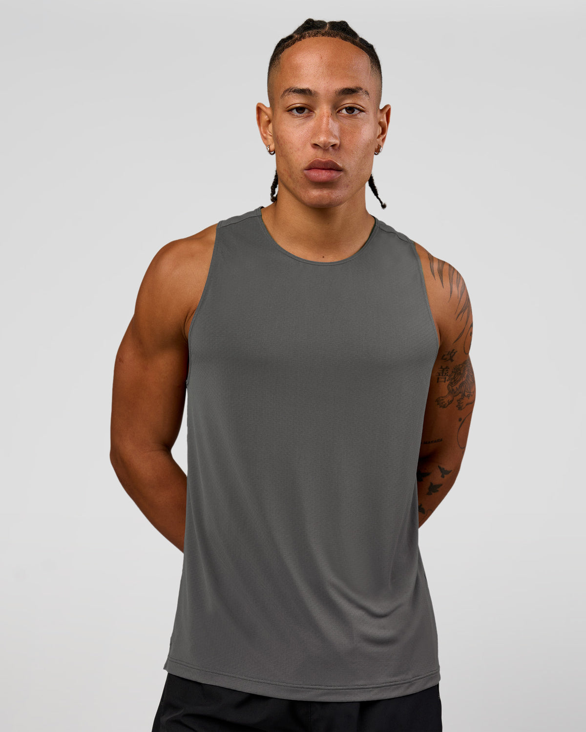 Man wearing Rep Training Tank - Dark Storm | Model:Malebo | Size:M