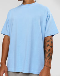 Man wearing Strong is Beautiful Heavyweight Oversized Tee - Open Air | Model:Malebo | Size:M | Thumbnail Index: 6