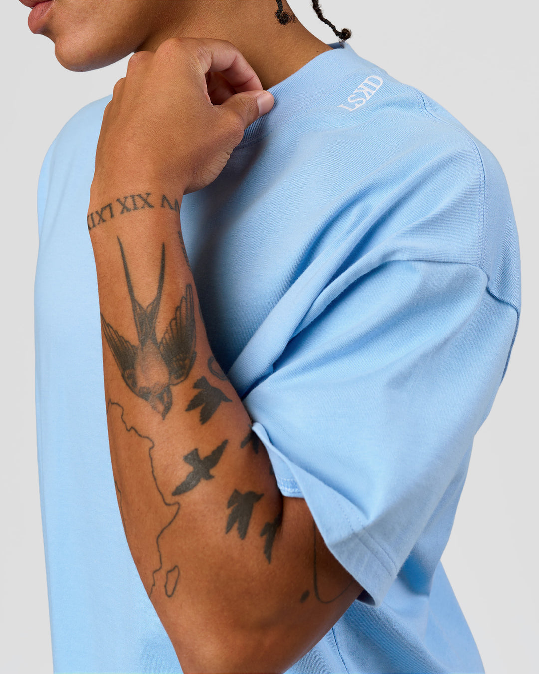 Man wearing Strong is Beautiful Heavyweight Oversized Tee - Open Air | Model:Malebo | Size:M - view 17