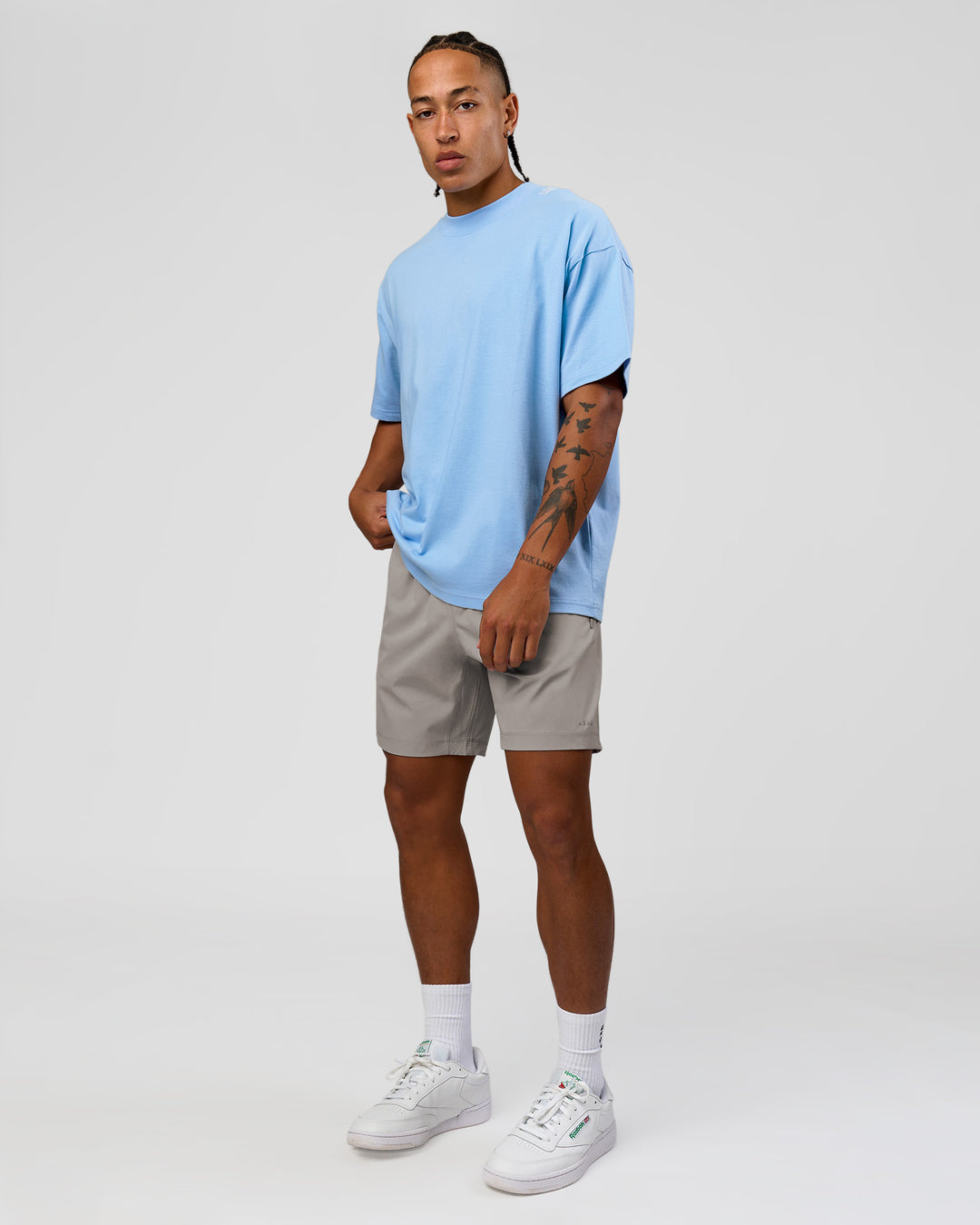 Man wearing Strong is Beautiful Heavyweight Oversized Tee - Open Air | Model:Malebo | Size:M - view 20