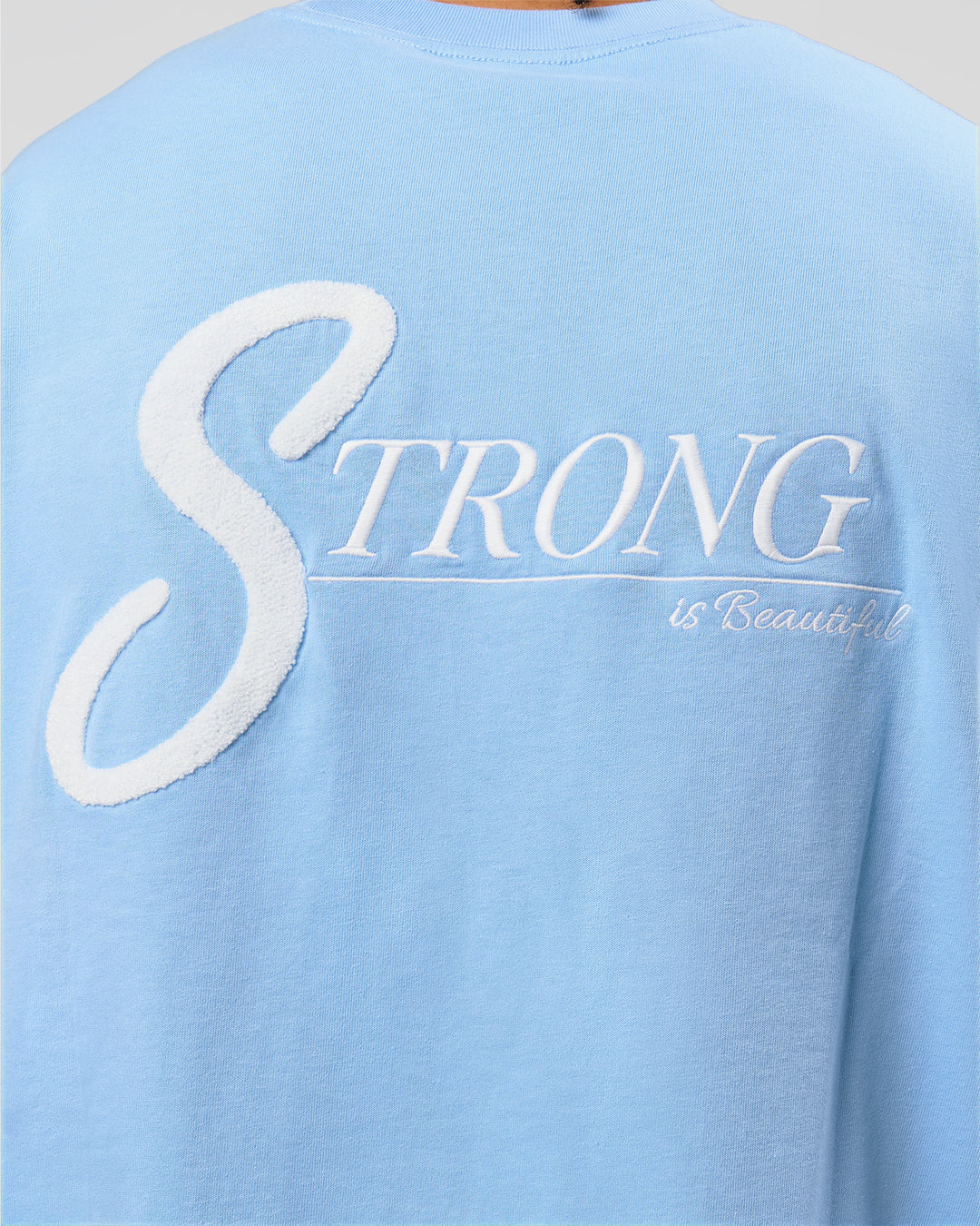 Man wearing Strong is Beautiful Heavyweight Oversized Tee - Open Air | Model:Malebo | Size:M - view 21