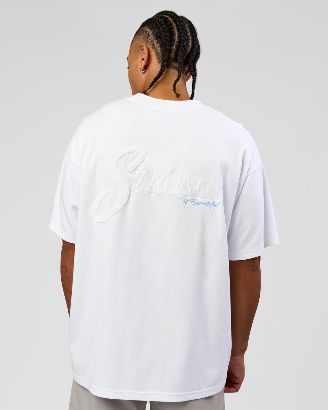 Man wearing Strong is Beautiful Heavyweight Oversized Tee - White | Model:Malebo | Size:M - view 4