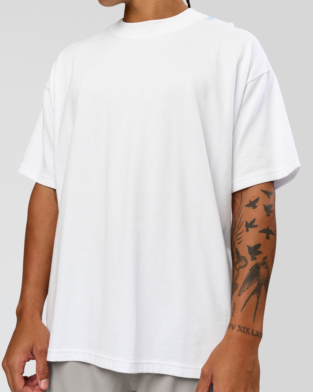 Man wearing Strong is Beautiful Heavyweight Oversized Tee - White | Model:Malebo | Size:M - view 6