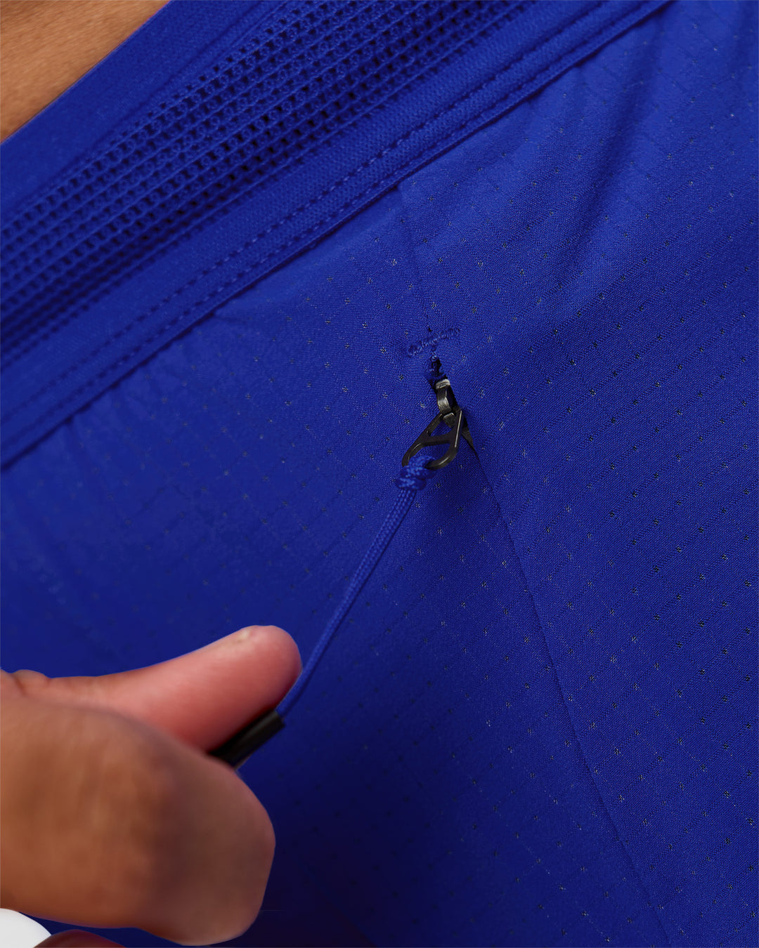 Man wearing UltraAir 5" Lined Performance Short  - Electric Indigo | Model:Malebo | Size:M