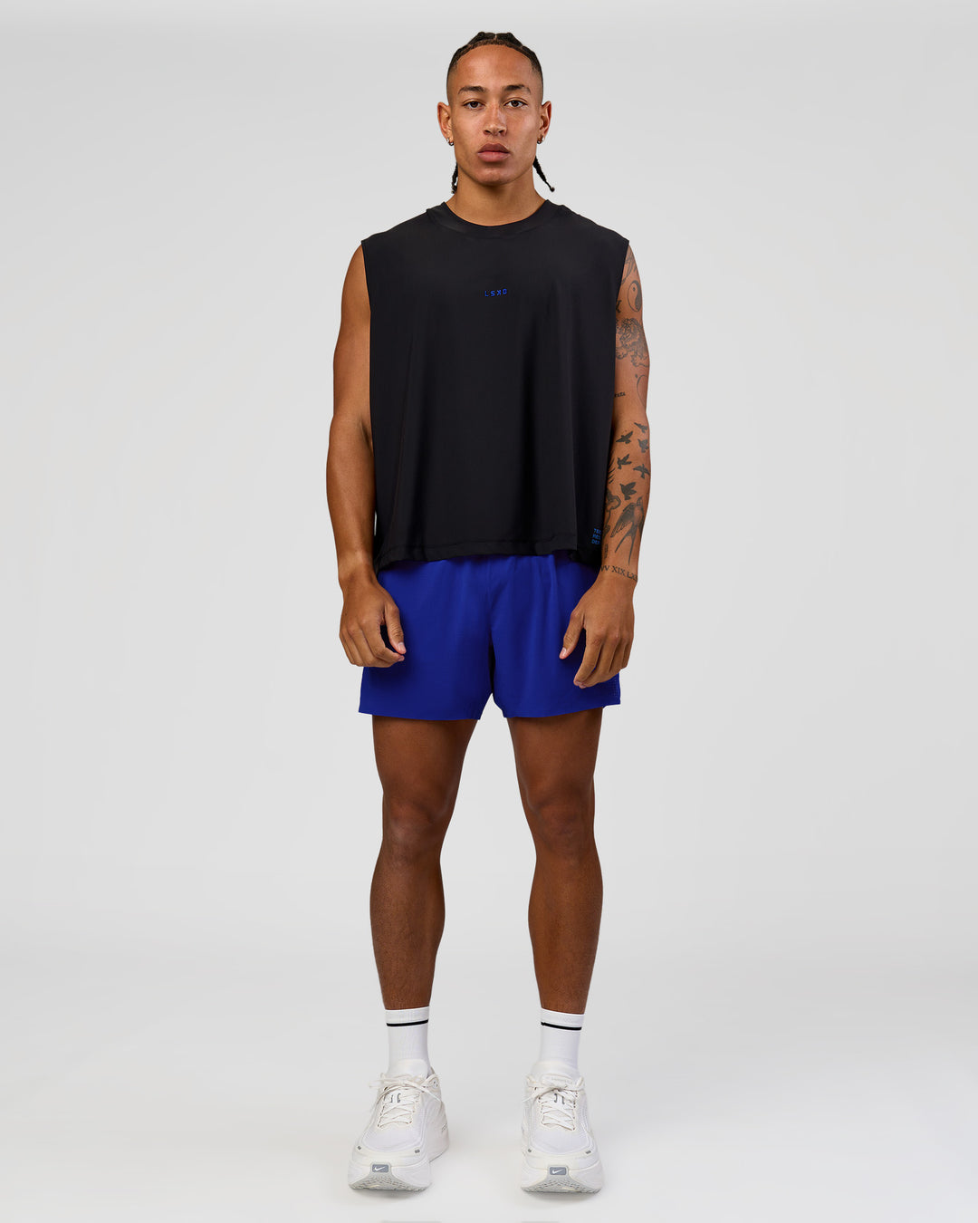 Man wearing UltraAir 5" Lined Performance Short  - Electric Indigo | Model:Malebo | Size:M