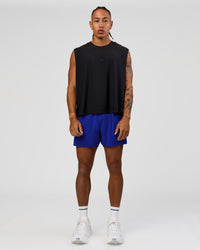 Man wearing UltraAir 5" Lined Performance Short  - Electric Indigo | Model:Malebo | Size:M