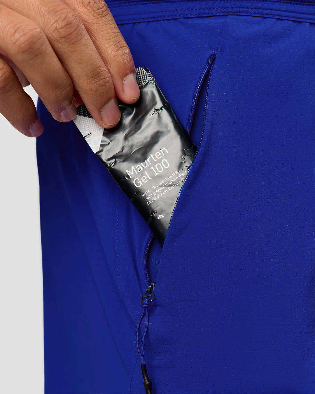 Man wearing UltraAir 5" Lined Performance Short  - Electric Indigo | Model:Malebo | Size:M