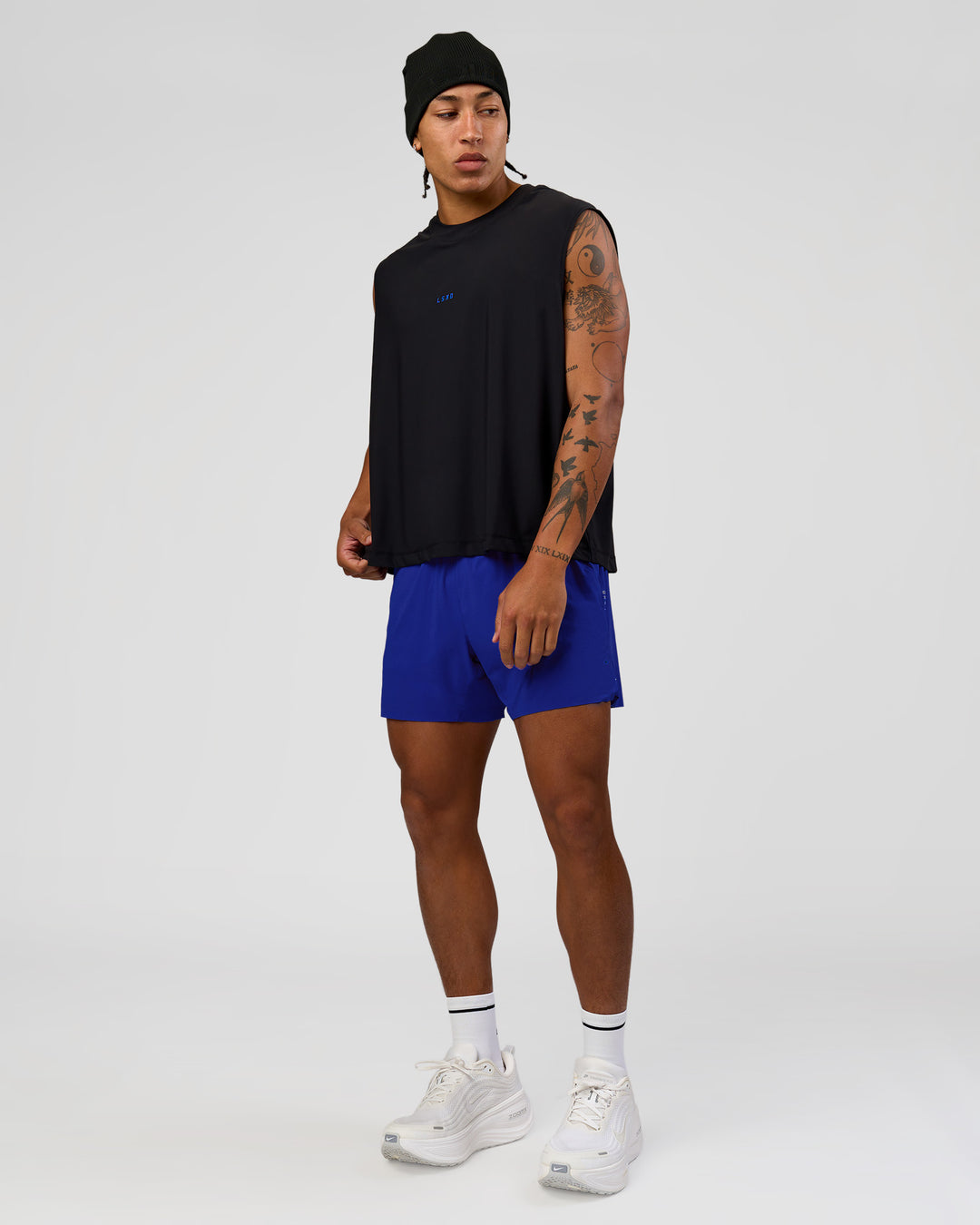 Man wearing UltraAir 5" Lined Performance Short  - Electric Indigo | Model:Malebo | Size:M