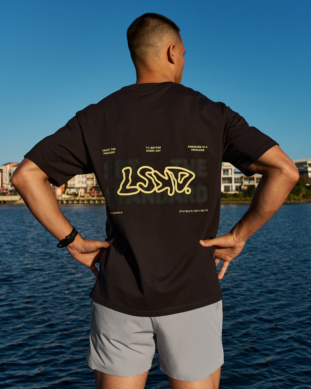 Man wearing Benchmark FLXCotton Oversized Tee - Onyx-Yellow Fizz - view 12