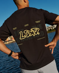 Man wearing Benchmark FLXCotton Oversized Tee - Onyx-Yellow Fizz | Thumbnail Index: 5