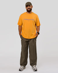 Man wearing VS6 1% Better Fathers Day FLXCotton Oversized Tee - Warm Apricot | Model:Jordan | Size:XL | Thumbnail Index: 13