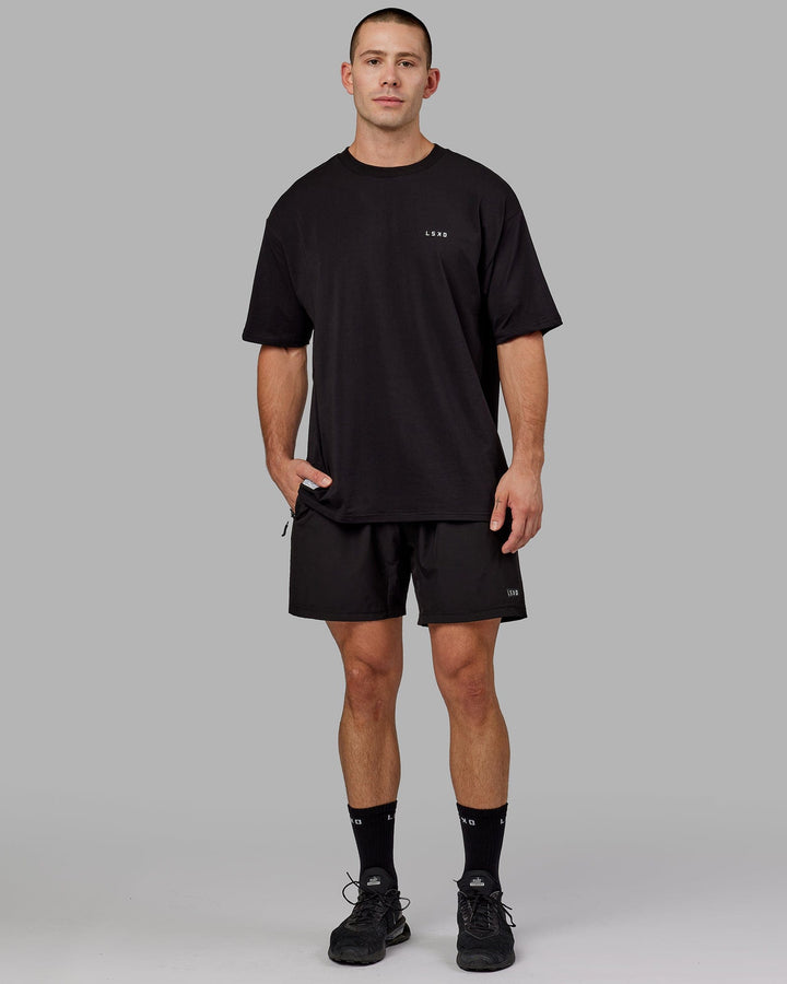 Man wearing Unisex VS6 FLXCotton Tee Oversize - Black-White