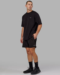 Man wearing Unisex VS6 FLXCotton Tee Oversize - Black-White