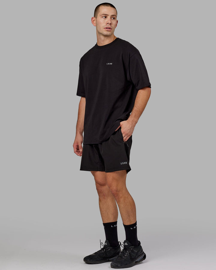 Man wearing Unisex VS6 FLXCotton Tee Oversize - Black-White