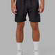 Man wearing Rep 7" Performance Short - Black Etching