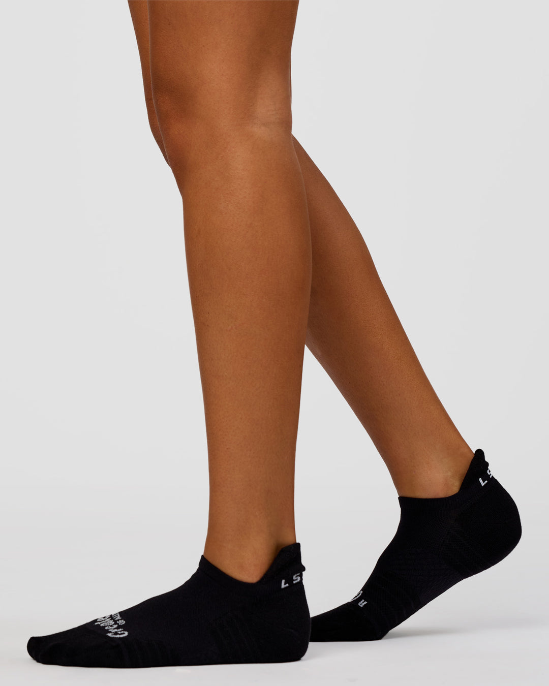 Studio image of Accelerate Performance Ankle Socks - Black-White - view 4