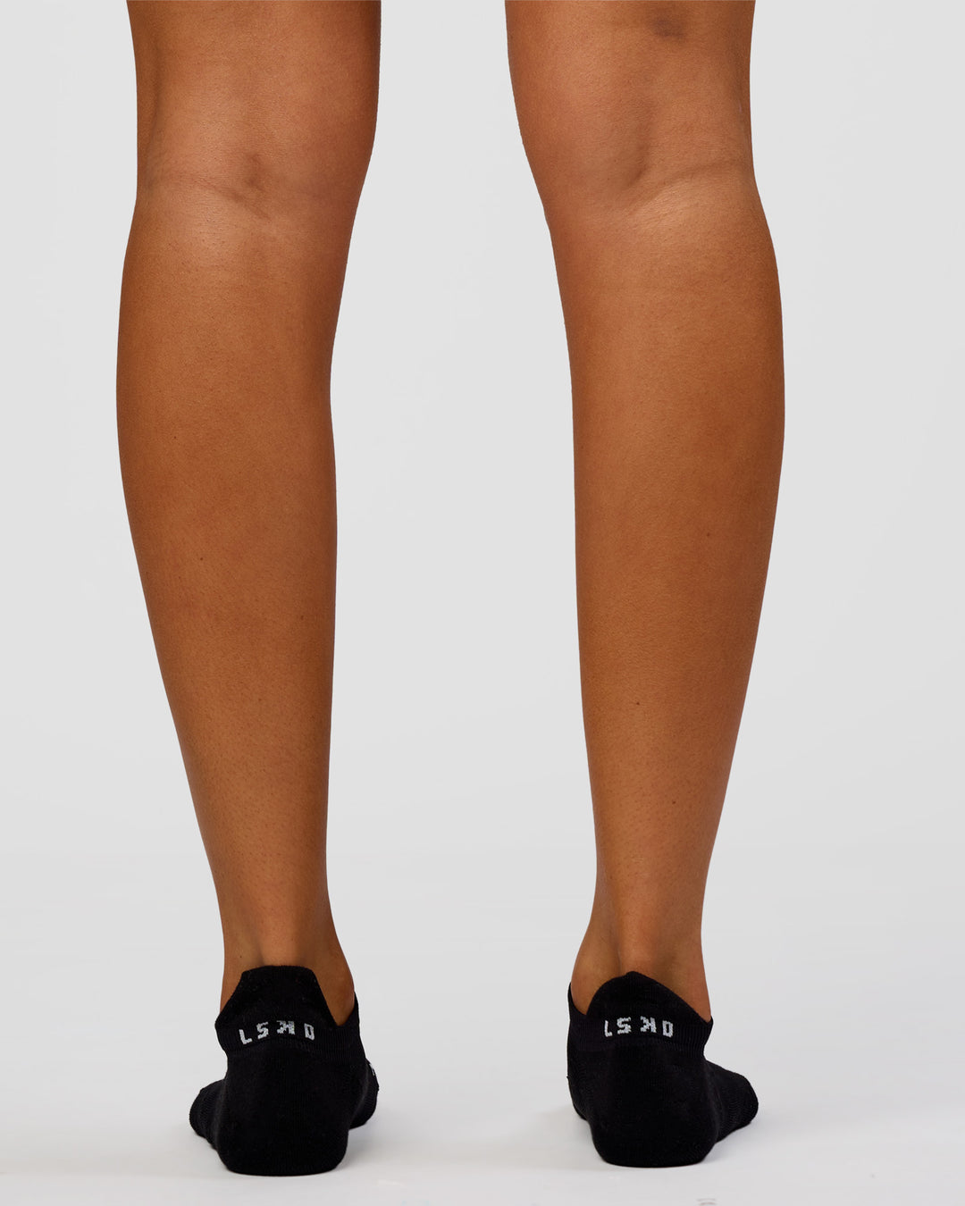 Studio image of Accelerate Performance Ankle Socks - Black-White - view 5