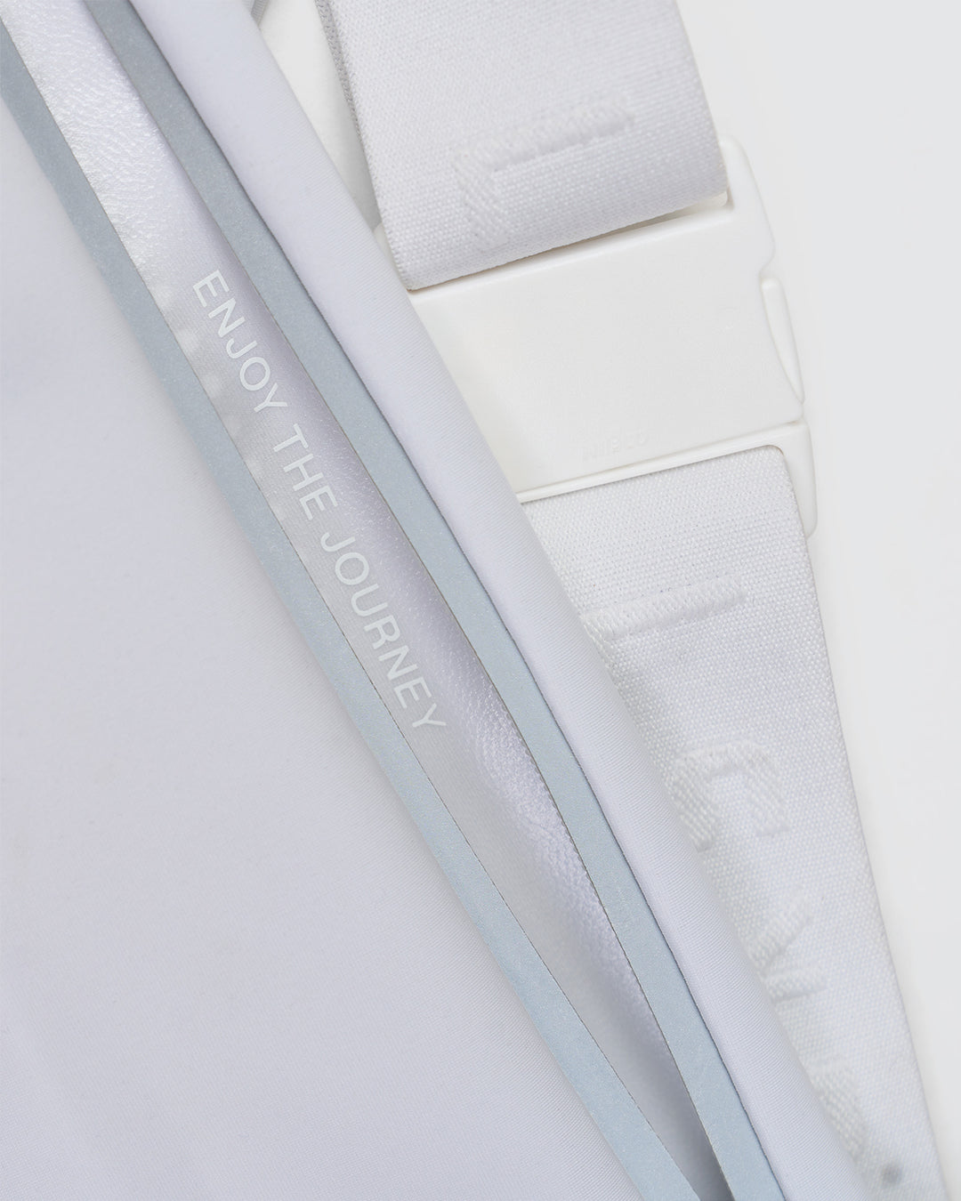 Studio image of Accelerate Run Belt - White-Reflective - view 13