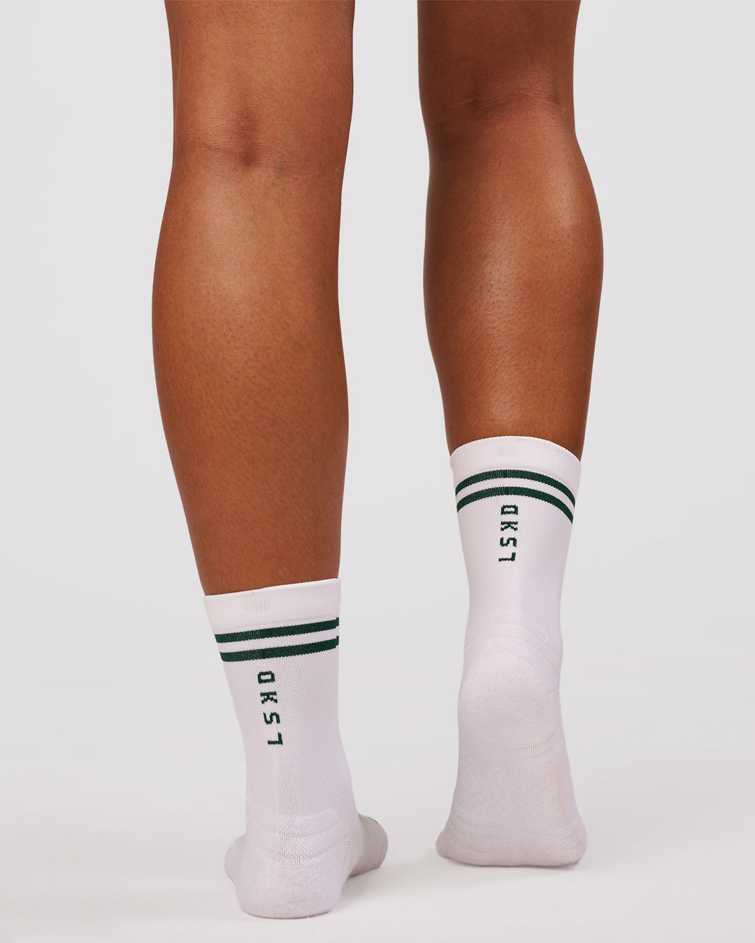 Studio image of Here Now Performance Quarter Socks - Midnight Green - view 1