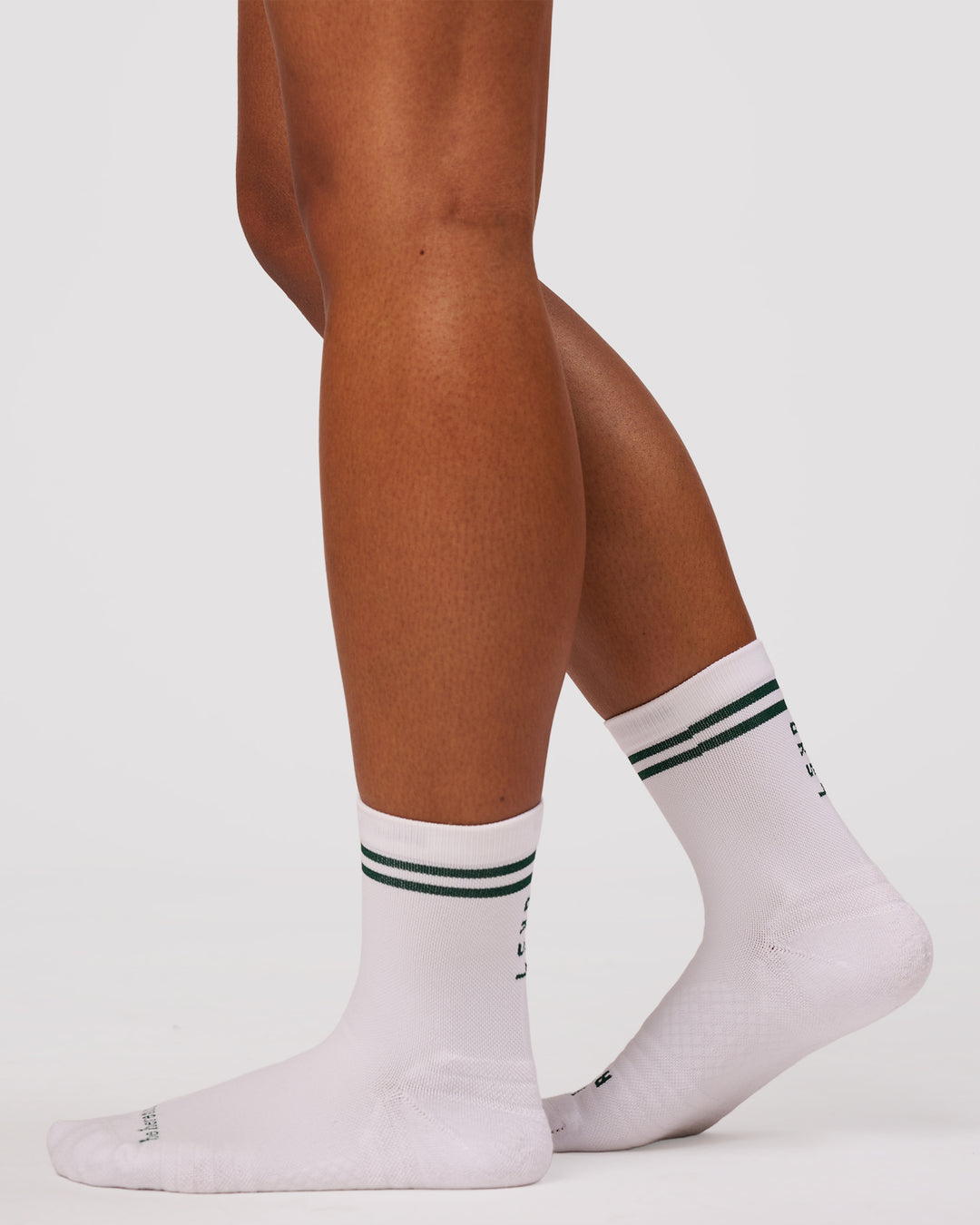 Studio image of Here Now Performance Quarter Socks - Midnight Green - view 6