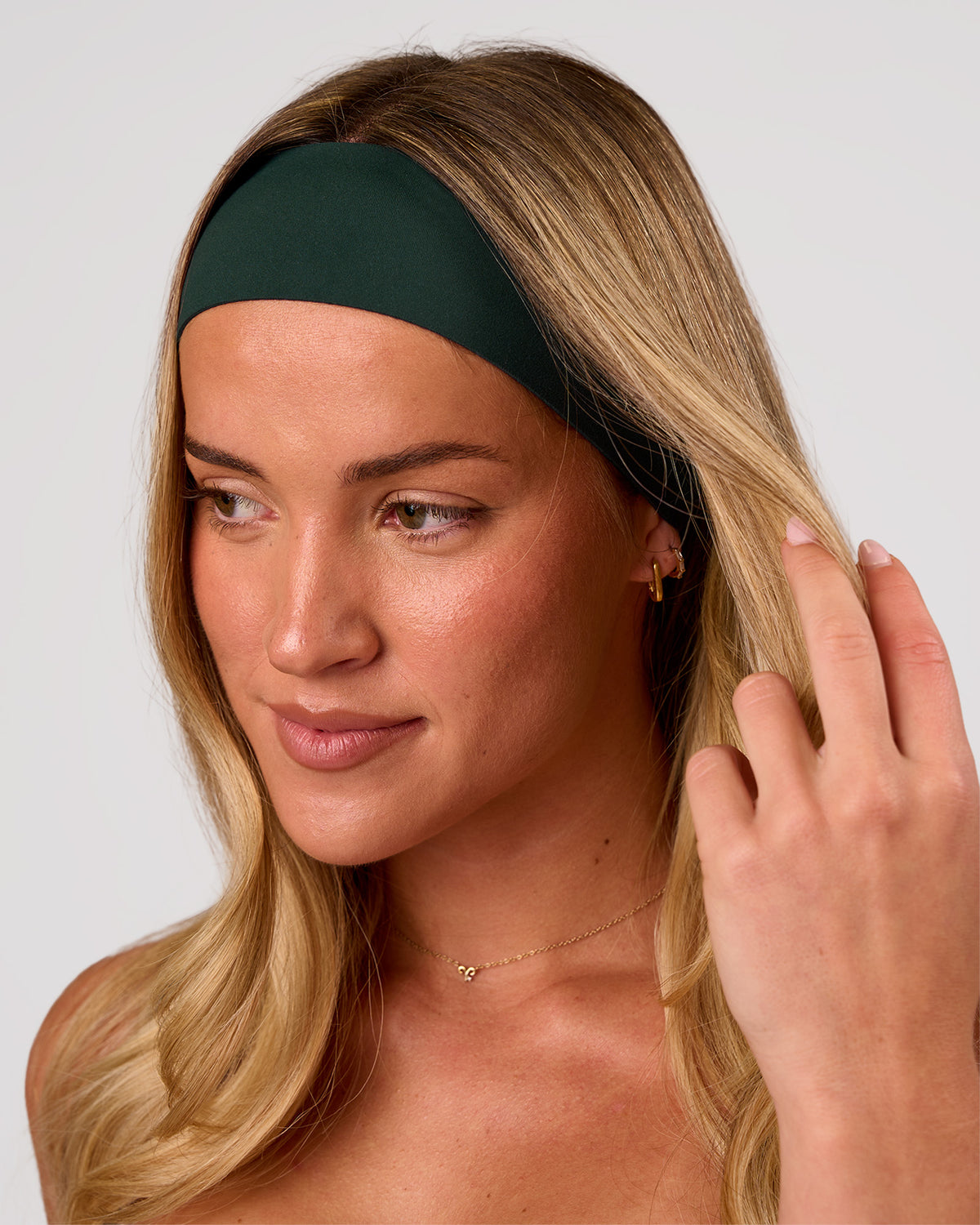 Studio image of Pace Bonded Headband - Midnight Green